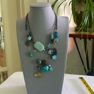 Multi-strand Turquoise and Beaded necklace.